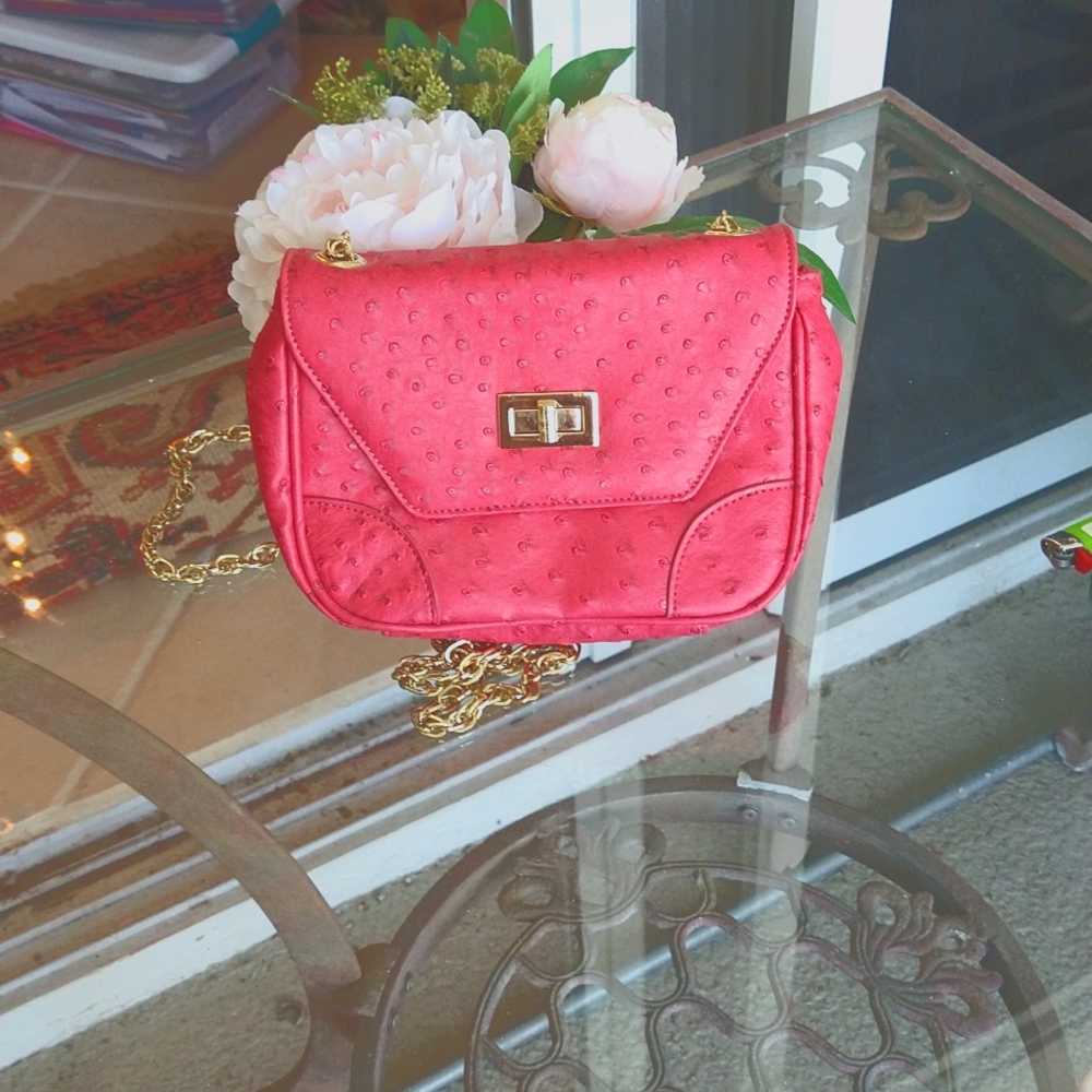 VGUC. Vintage Chico's crossbody bag. The color is dark rose/raspberry.